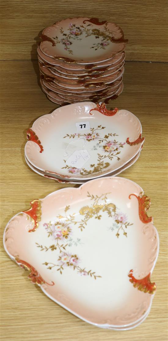 A Limoges sixteen piece floral painted pink bordered dessert service